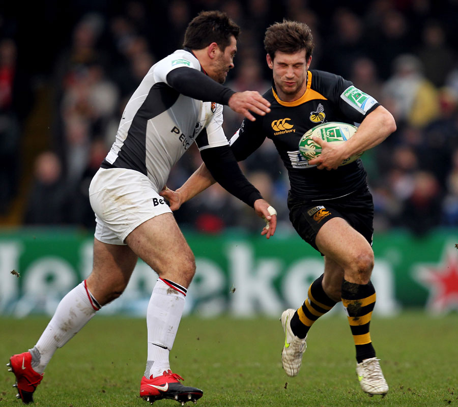 Wasps centre Dominic Waldouck takes on Florian Fritz