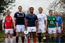 France flanker Thierry Dusautoir poses with the Six Nations trophy and his fellow captains