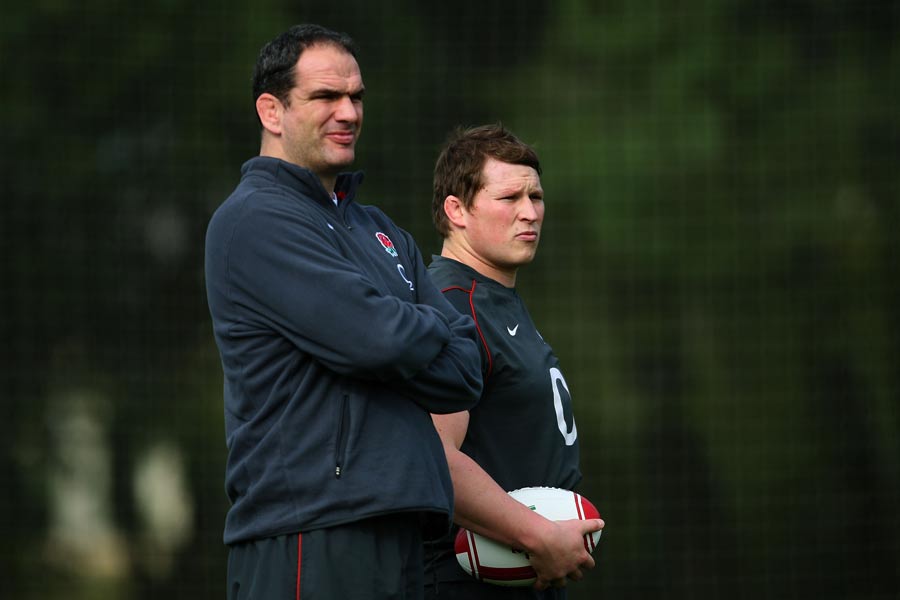 Martin Johnson and Dylan Hartley watch on at England training