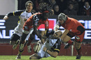 La Rochelle's Andres Bordoy is set upon by Paul Sackey