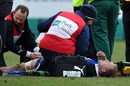 Bath's Stuart Hooper receives treatment during the match against Newcastle