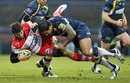 Gloucester's Jonny May is tackled by Leeds' Henry Fa'afili