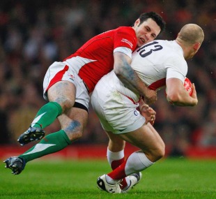 Wales' Stephen Jones tackles England's Mike Tindall, Wales v England, Six Nations, Millennium Stadium, Cardiff, Wales, February 14, 2009