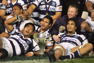 Keven Mealamu (L), Isaia Toeava and Jerome Kaino of Auckland celebrate with the trophy after winning the Air New Zealand Cup Final between Auckland and Wellington at Eden Park in Auckland, New Zealand on October 20, 2007. 