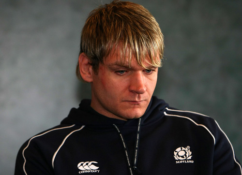 Scotland rugby player Scott MacLeod sits during a press conference 