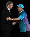IRB chairman Bernard Lapasset shakes hands with New Zealand Prime Minister John Key