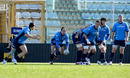 Italy skipper gets the ball away from a scrum during training