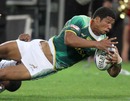 Bernado Botha of South Africa dives for the line during their draw with Fiji