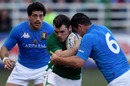 Ireland's Cian Healy barges into Italy's Josh Sole