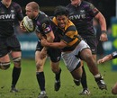 The Ospreys' Tom Isaacs is tackled by Wasps' Billy Vunipola
