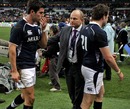 Scotland coach Andy Robinson commiserates with his players