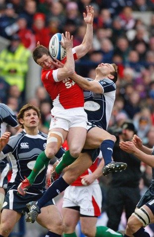 Wales' Shane Williams and Scotland's Mike Blair compete for a high ball, Scotland v Wales, Six Nations, Murrayfield, Scotland, February 8, 2009
