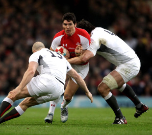Wales' James Hook takes on Mike Tindall and Louis Deacon, Wales v England, Six Nations, Millennium Stadium, Cardiff, Wales, February 4, 2011