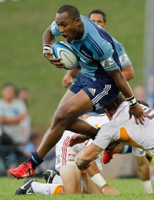 The Blues' Joe Rokocoko hurdles the Chiefs' defence, Blues v Chiefs, Super Rugby warm-up, Growers Stadium, Auckland, New Zealand, February 11, 2011