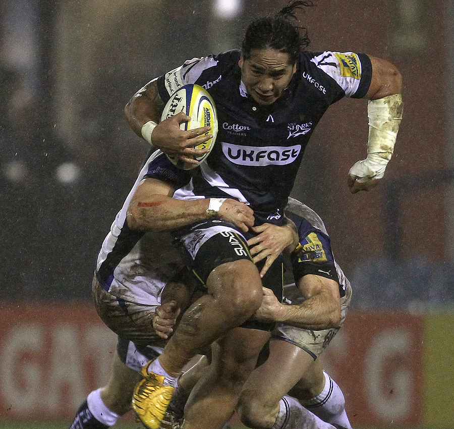 Sale's Andy Tuilagi tries to break clear of a Bath tackle