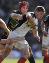 Saracens' David Strettle is held by the Northampton defence