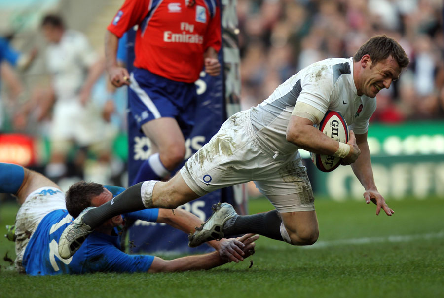 England wing Mark Cueto slides over to score