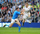 England wing Mark Cueto hacks the ball ahead