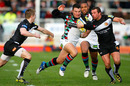 Harlequins centre George Lowe tries to race through a gap