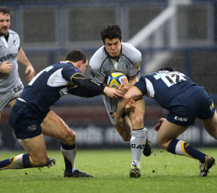 Leicester centre Anthony Allen takes on two Leeds tacklers, Leeds v Leicester, Aviva Premiership, Headingley, Leeds, England, February 13, 2011