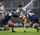 Leicester centre Anthony Allen takes on two Leeds tacklers