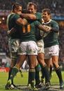 South Africa's Lwazi Mvovo is congratulated after scoring a try