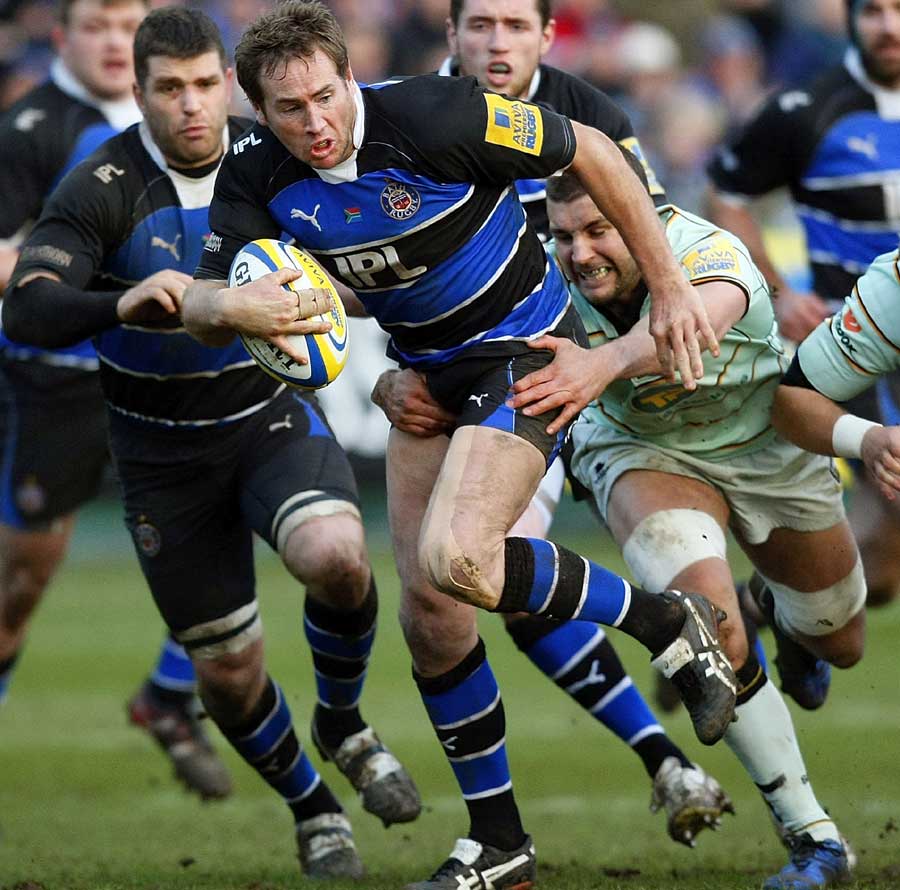 Bath fly-half Butch James surges out of the tackle