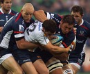 The Rebels' Gareth Delve works hard to protect the ball