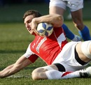 Sam Warburton slides in to score Wales' second try against Italy