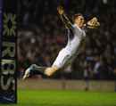 England wing Chris Aston swallow dives over the line only to be called back