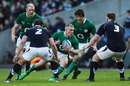 Ireland wing Keith Earls takes on Ross Ford and Moray Low