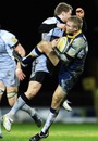 Newcastle's Alex Tait clashes with Leeds' Warren Fury