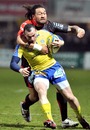 Clermont's Benoit Baby is tackled by Toulon's Fotunuupule Auelua