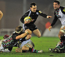 Newcastle's Micky Young exploits a gap in the Harlequins defence