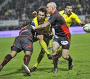 Clermont's Morgan Parra gets the ball away under pressure
