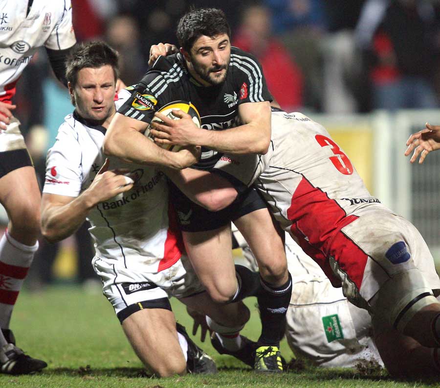 Aironi's Teto Tebaldi is felled by the Ulster defence