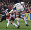 Gloucester fly-half Nick Robinson is upended