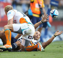 Stormers fullback Conrad Jantjies off-loads in the tackle