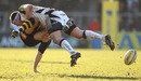 Sale's Neil Briggs tackles Wasps' Nic Berry