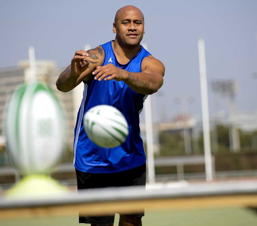 Jonah Lomu takes takes part in a rugby clinic at  the Global Sports Forum