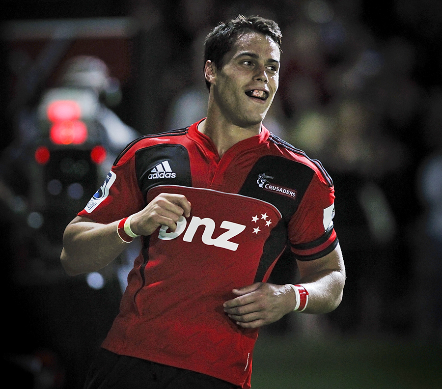 The Crusaders' Sean Maitland celebrates scoring a try
