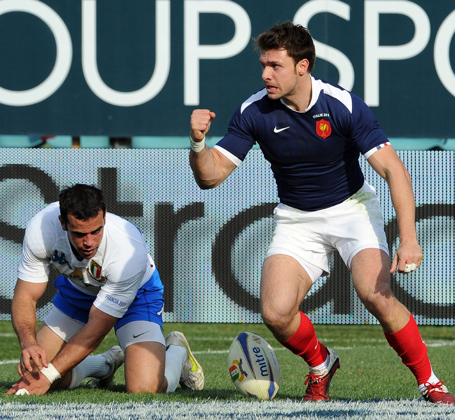 France wing Vincent Clerc celebrates his try