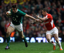 Ireland's Tommy Bowe takes on Wales wing Shane Williams