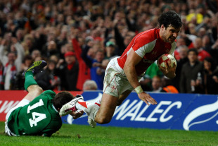 Wales scrum-half Mike Phillips dives in at the corner, Wales v Ireland, Six Nations, Millennium Stadium, Cardiff, Wales, March 12, 2011
