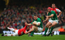Wales prop Craig Mitchell tackles Ireland's Cian Healy