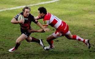 Dragons wing Will Harries is caught by Tom Voyce, Gloucester v Dragons, Anglo-Welsh Cup, Kingsholm, Gloucester, March 13, 2011