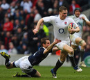 Scotland's Chris Paterson tackles England's Chris Ashton