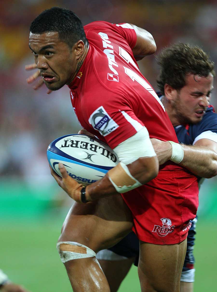The Reds' Digby Ioane takes on the Rebels' Danny Cipriani, Reds v Rebels, Super Rugby, Suncorp Stadium, Brisbane, Australia, March 18, 2011