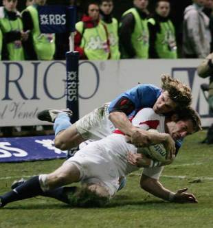 England winger Mark Cueto slides in to score against Italy at the Stadio Flaminio, February 11 2006