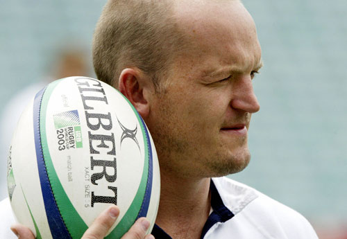 Scottish centre Gregor Townsend holds the ball 